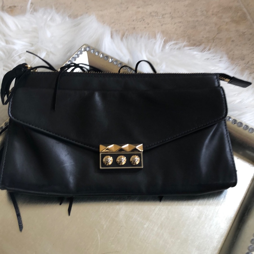 Fringe small black leather purse with gold clasp
